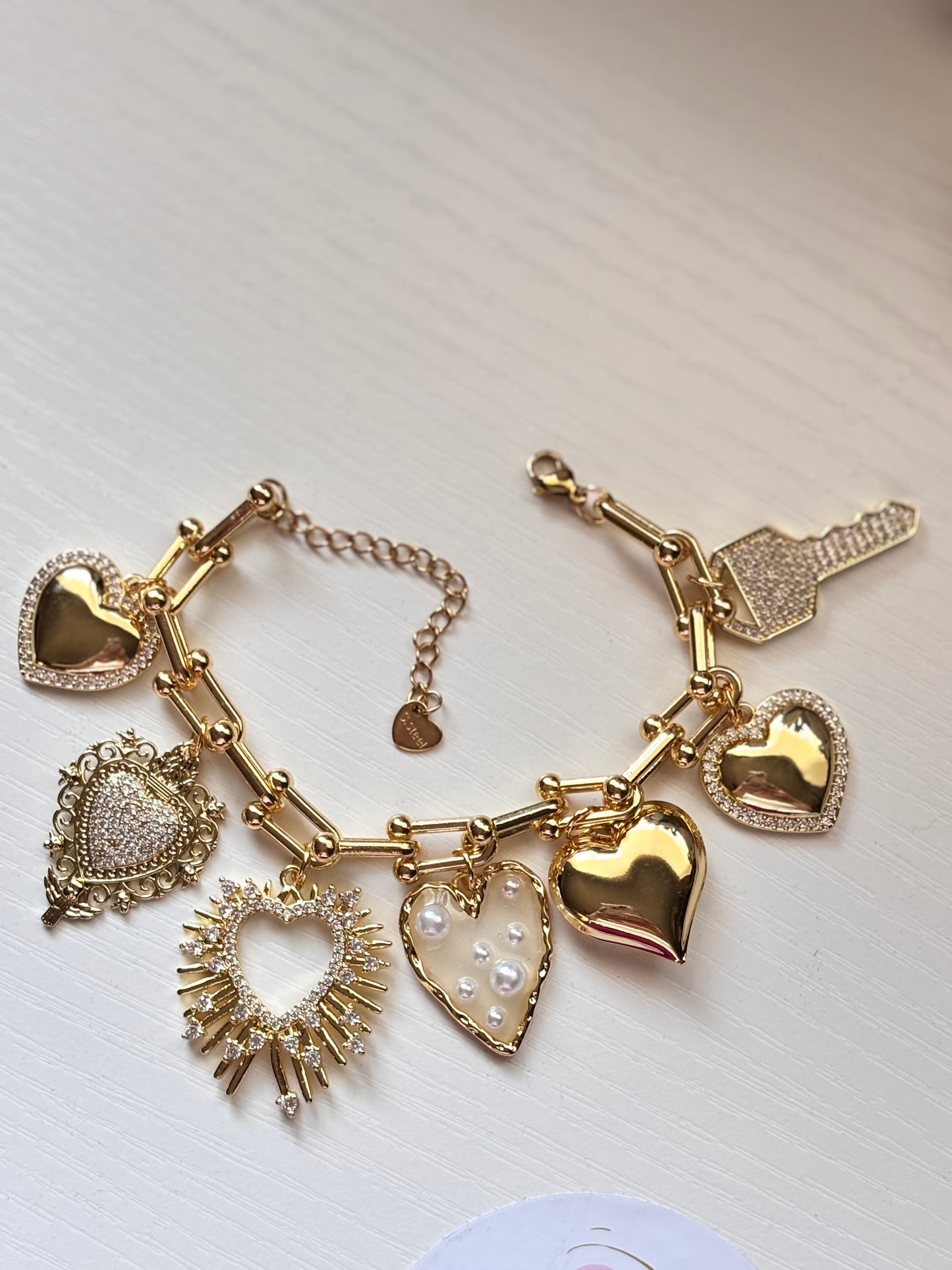 Gold charm bracelet